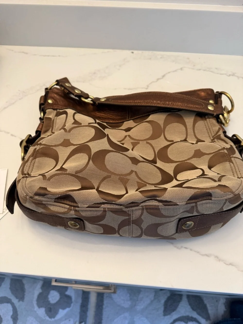 Coach metallic, brown, and tan Zoe bag